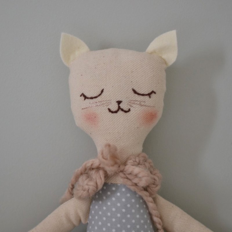 doll with cat